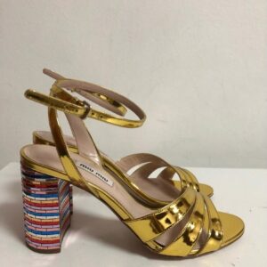 Miu Miu Dourado